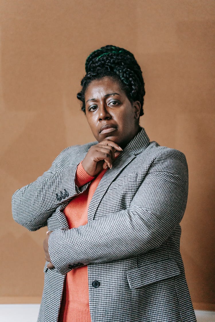 Confident Black Woman In Formal Clothes