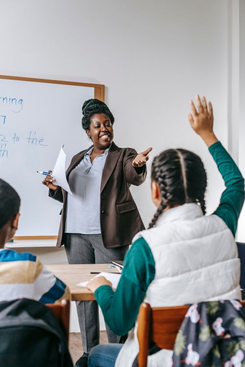 Teacher with a young child