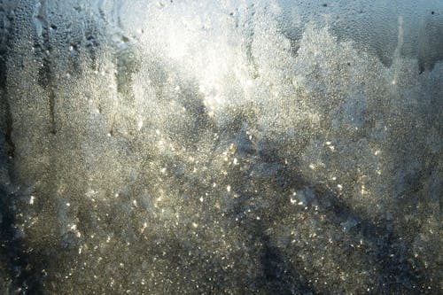 Abstract background of glass with water flows