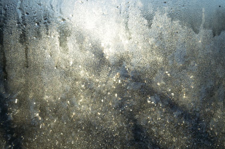 Abstract Background Of Glass With Water Flows