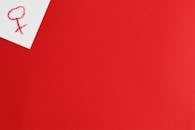 Venus Symbol in Corner of Red Background