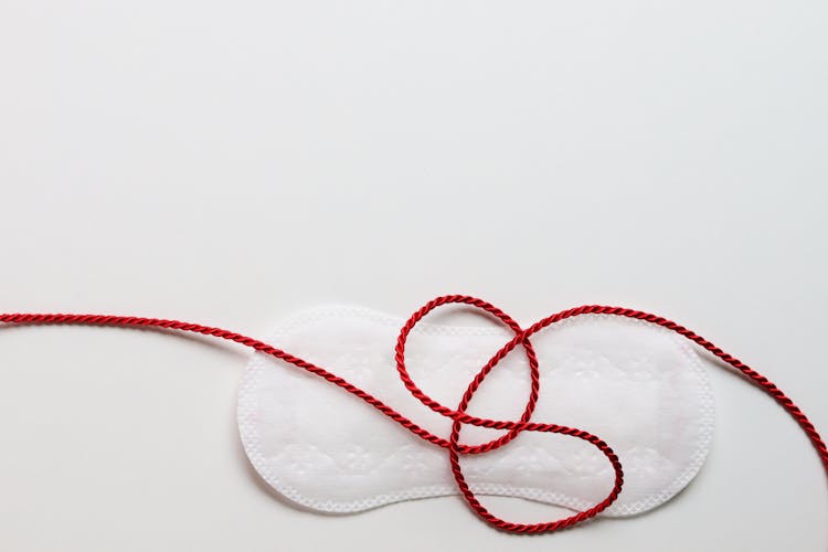 Menstruation Pad With A Red String