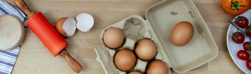 Egg placed on table in kitchen