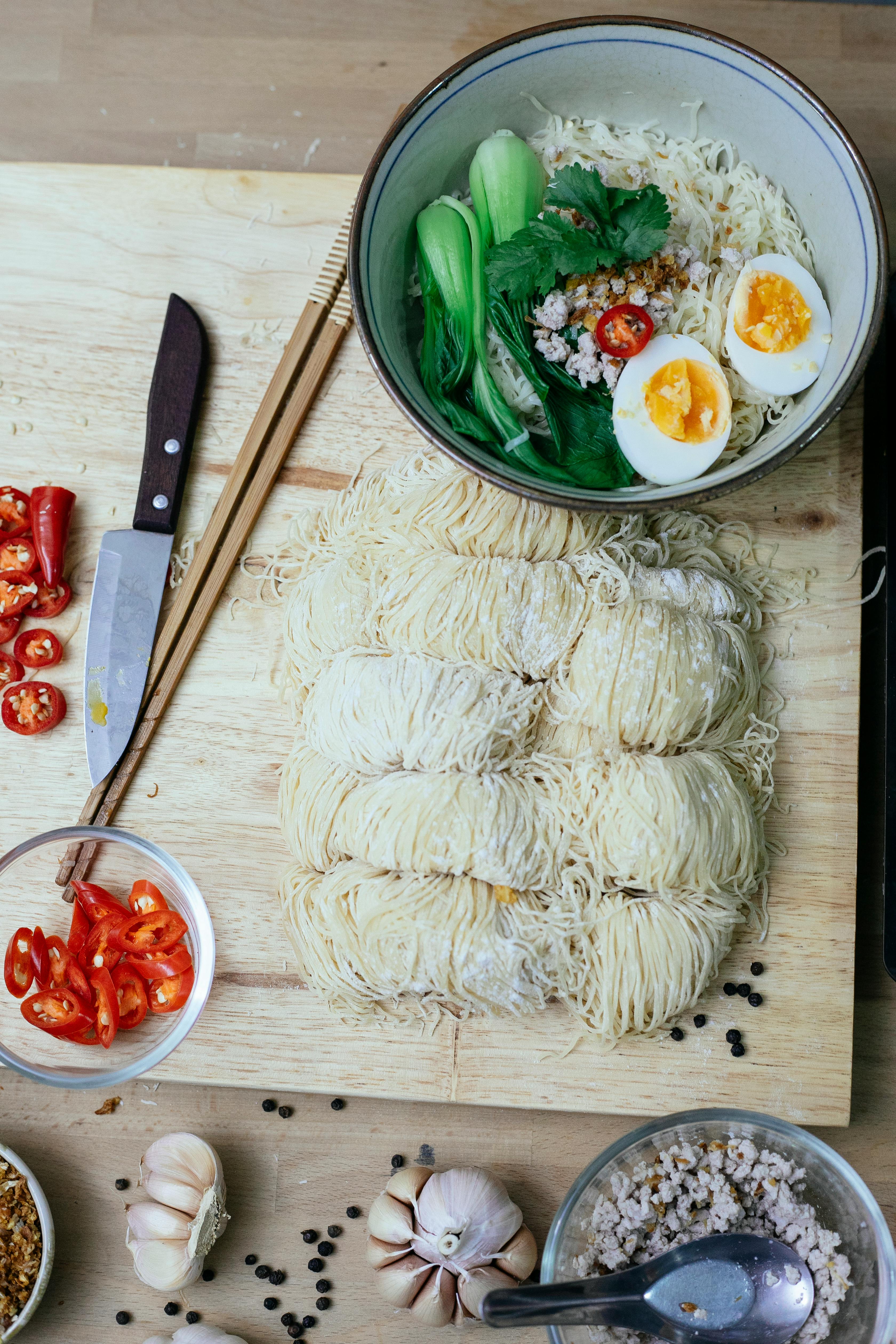 Ramen with raw pasta on table \u00b7 Free Stock Photo