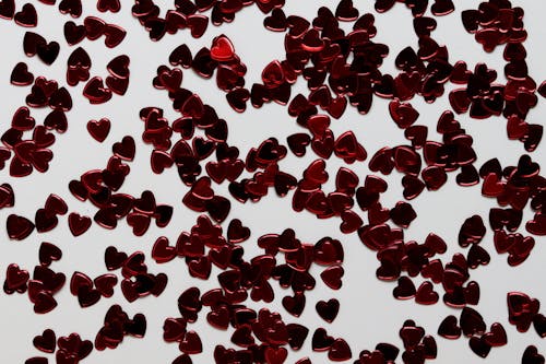 Red Heart Shaped Decors on White Surface
