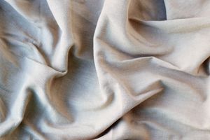 Crumpled light brown cotton fabric — photo by Mike Murray on Pexels