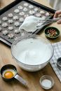 Crop chef preparing meringue mixture for meringue at home