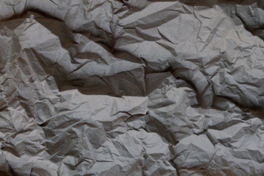 Detailed texture of crumpled paper, ideal for backgrounds and design projects.