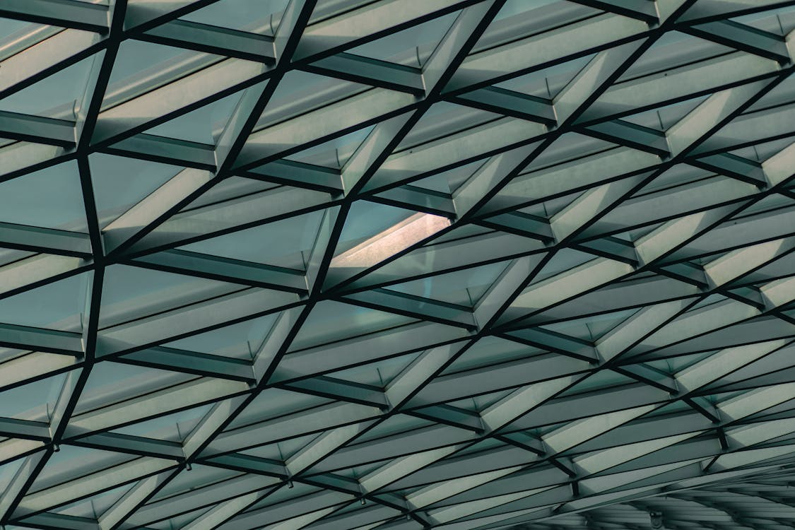 Geometric glass ceiling of modern building · Free Stock Photo