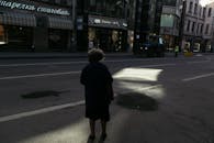 Unrecognizable man standing on road