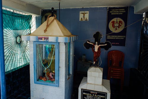 Christian prayer corner in rural hut