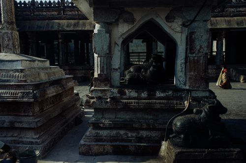 Free Weathered oriental stone sculptures statues and buildings located in medieval historic Hampi village in India Stock Photo
