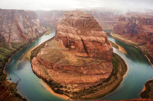 Brown Rock Formation Beside River