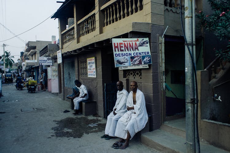 Indian Men Sitting Near Local Market