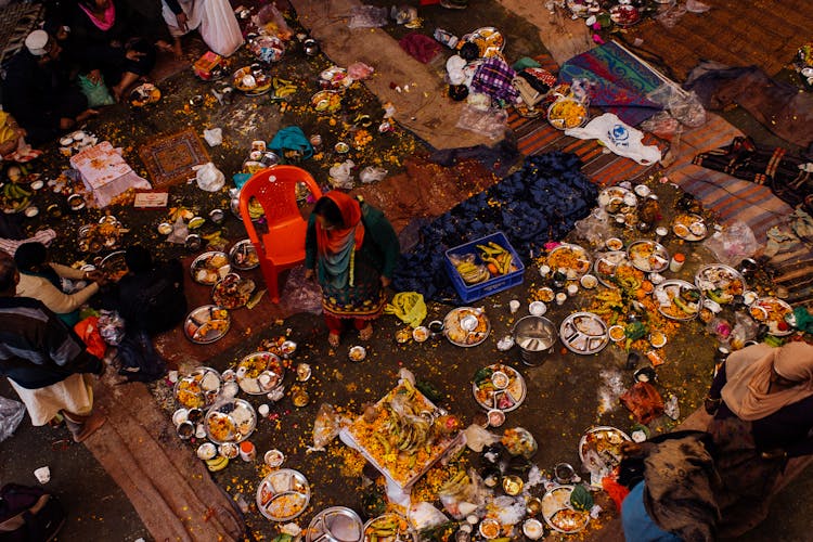 Poor Indian People With Food On Plates