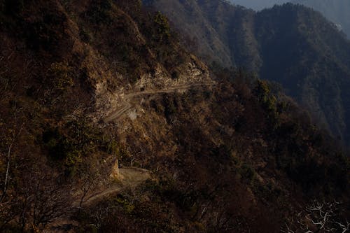 Road located in mountainous area in daylight