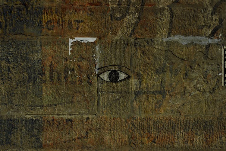 Weathered Stone Wall With Scratches And Eye Picture