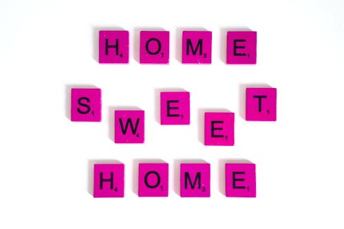 Home Sweet Home Quote Made of Pink Scrabble Pieces