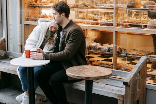 Free Young couple having rest in small cafeteria Stock Photo