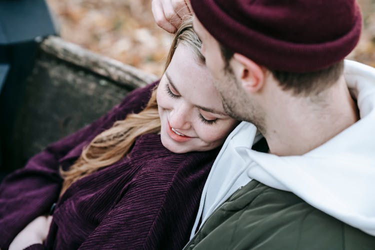 Loving Tender Couple Cuddling And Smiling