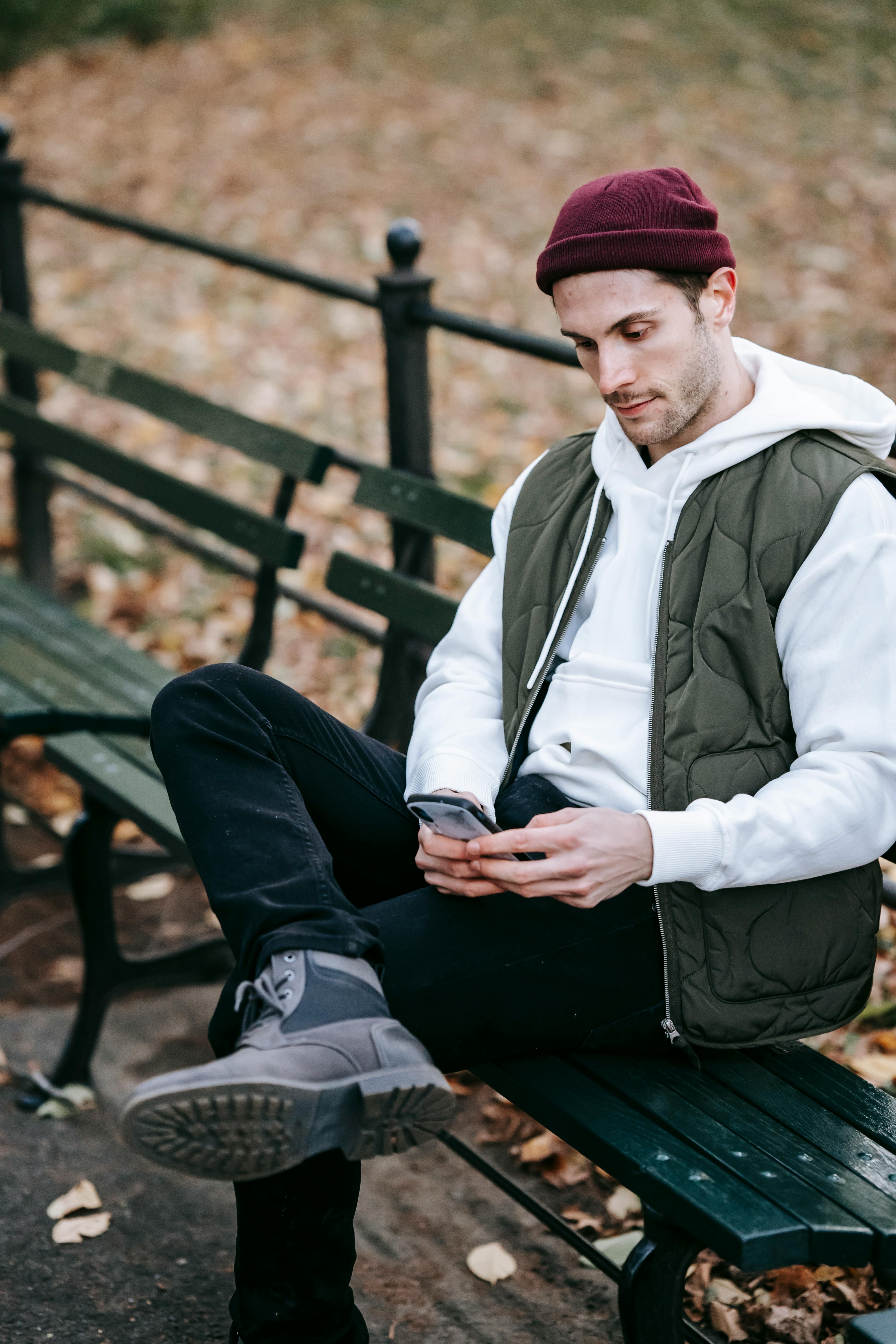 concentrated man chatting in park