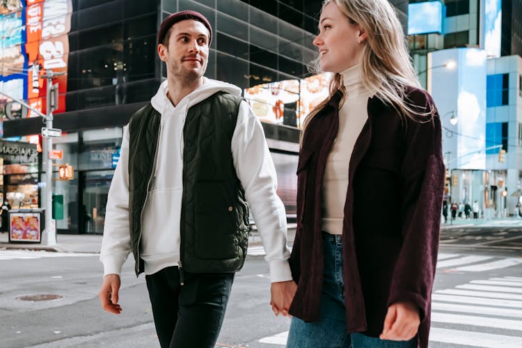 Romantic Couple Walking On Crosswalk