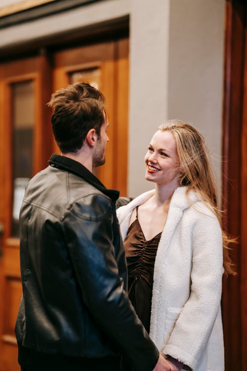 Cheerful woman with anonymous boyfriend