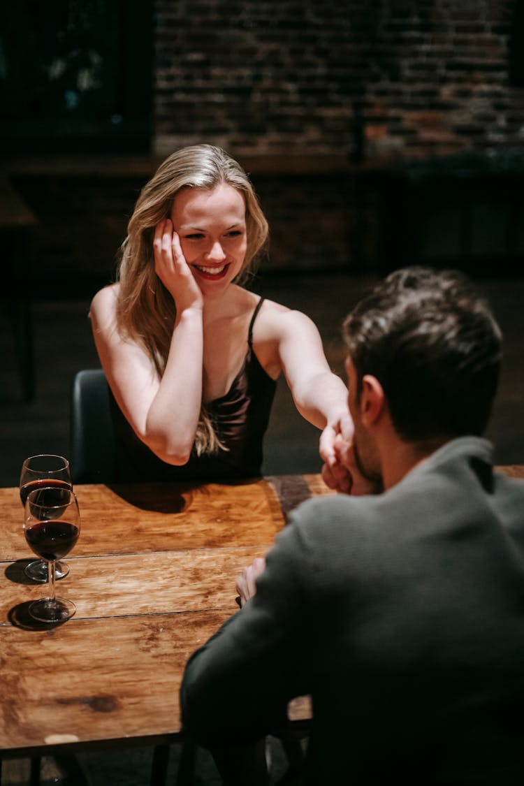 Couple On Romantic Dinner In Cafe