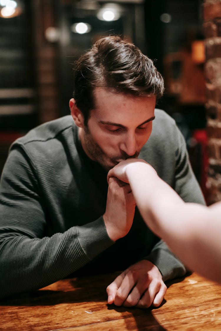 Couple Enjoying Romantic Date In Restaurant