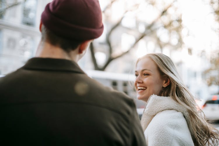 Happy Couple Standing In City Street