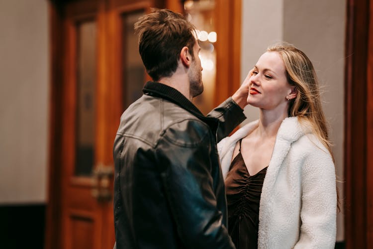 Romantic Couple Near Entrance Of Restaurant