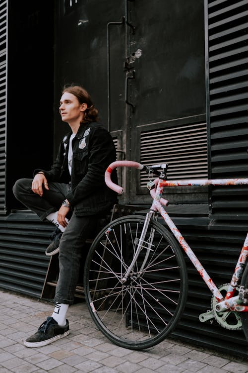 Základová fotografie zdarma na téma cyklista, denim, džíny