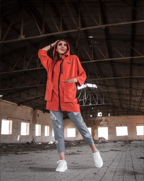 Free Model posing in urban style jacket and jeans inside a derelict factory. Stock Photo