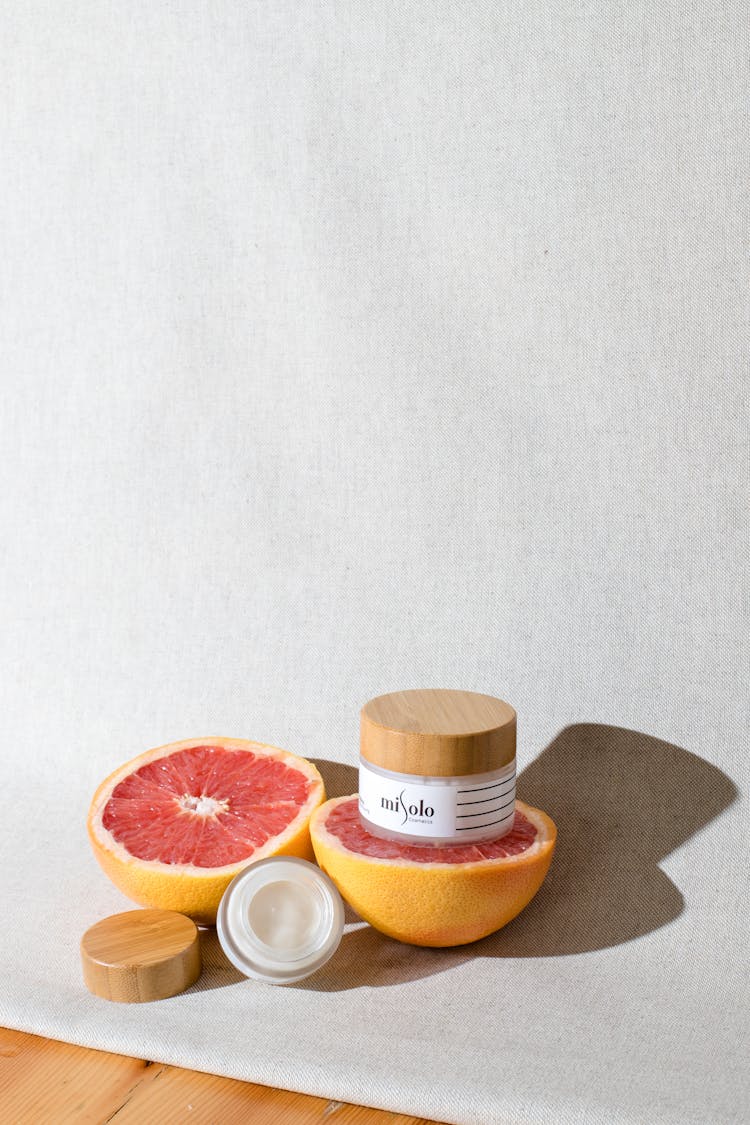 Face Cream Jar On Grapefruit