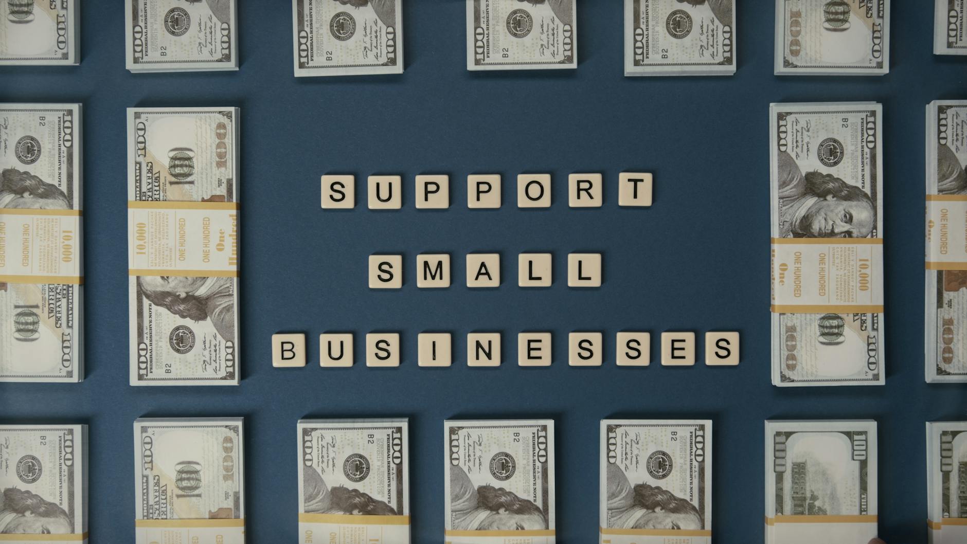 Dollar Bills Around Letter Tiles