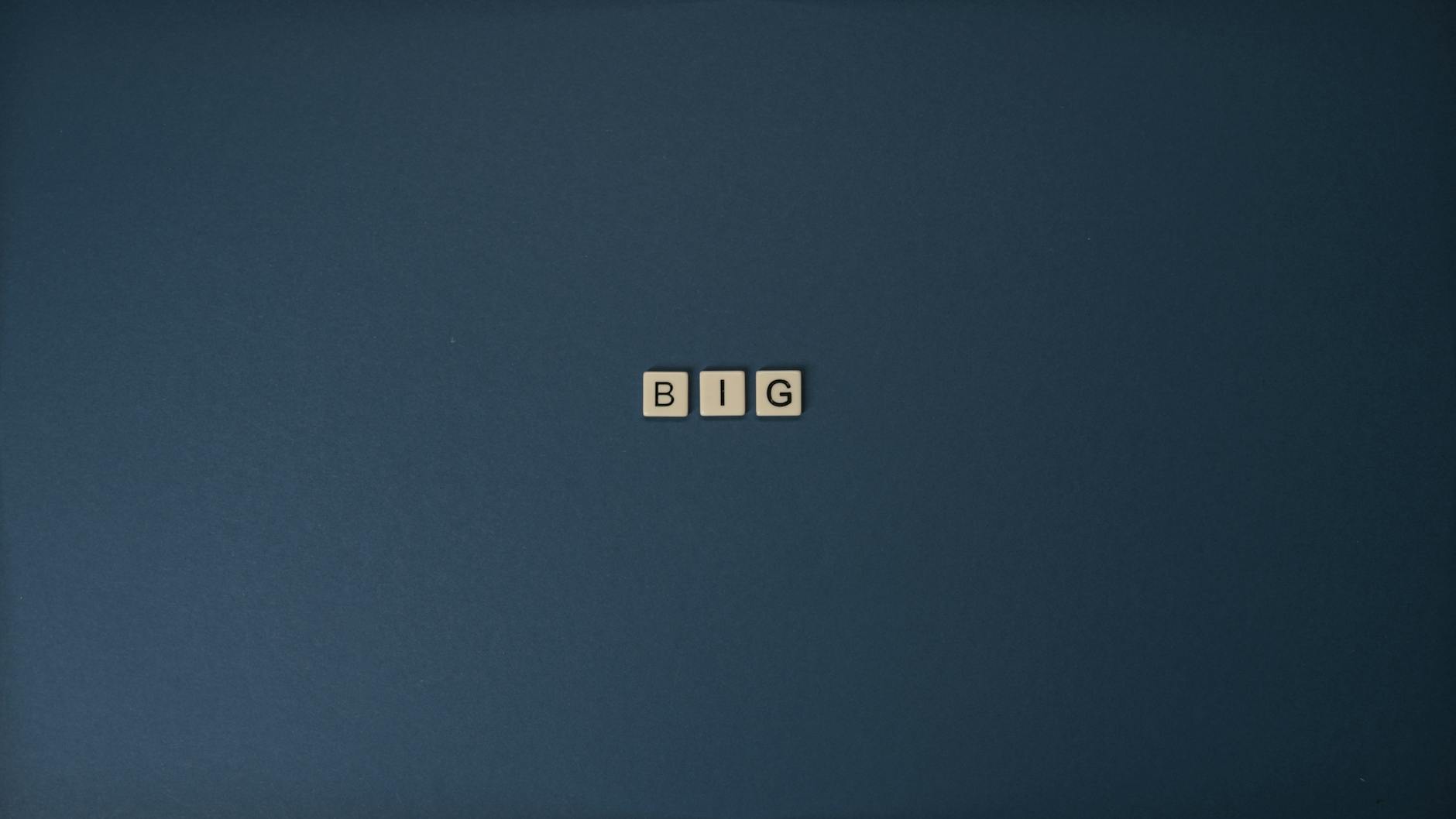 Letter Tiles on Blue Surface