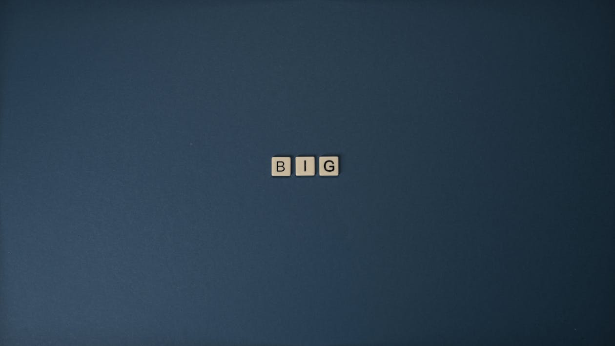 Letter Tiles on Blue Surface