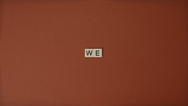 Letter Tiles on Brown Surface
