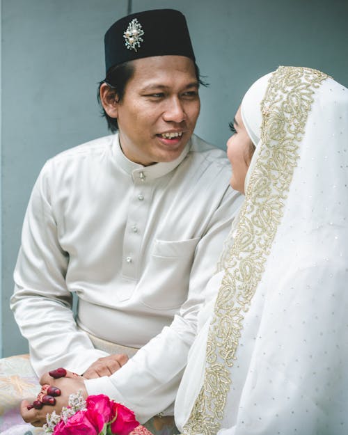 Bride and Groom Holding Hands