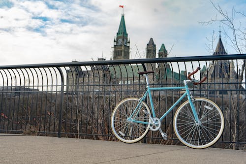 Blue Bike Against Parliament Building in Ottawa, Canada