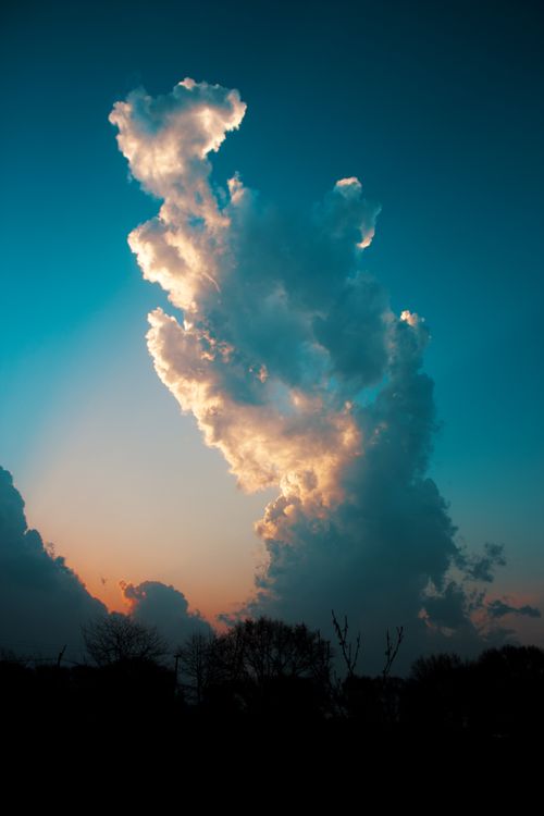 Free Stunning cloud silhouette at sunset over Santa Rosa de Calamuchita, creating a dramatic sky. Stock Photo