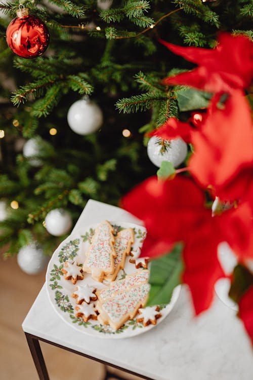 Shallow Focus of Christmas Cookies on White Table 