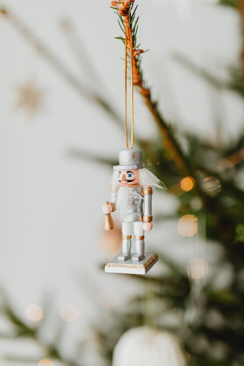 Christmas tree decorations with red and gold ornaments in elegant holiday setting