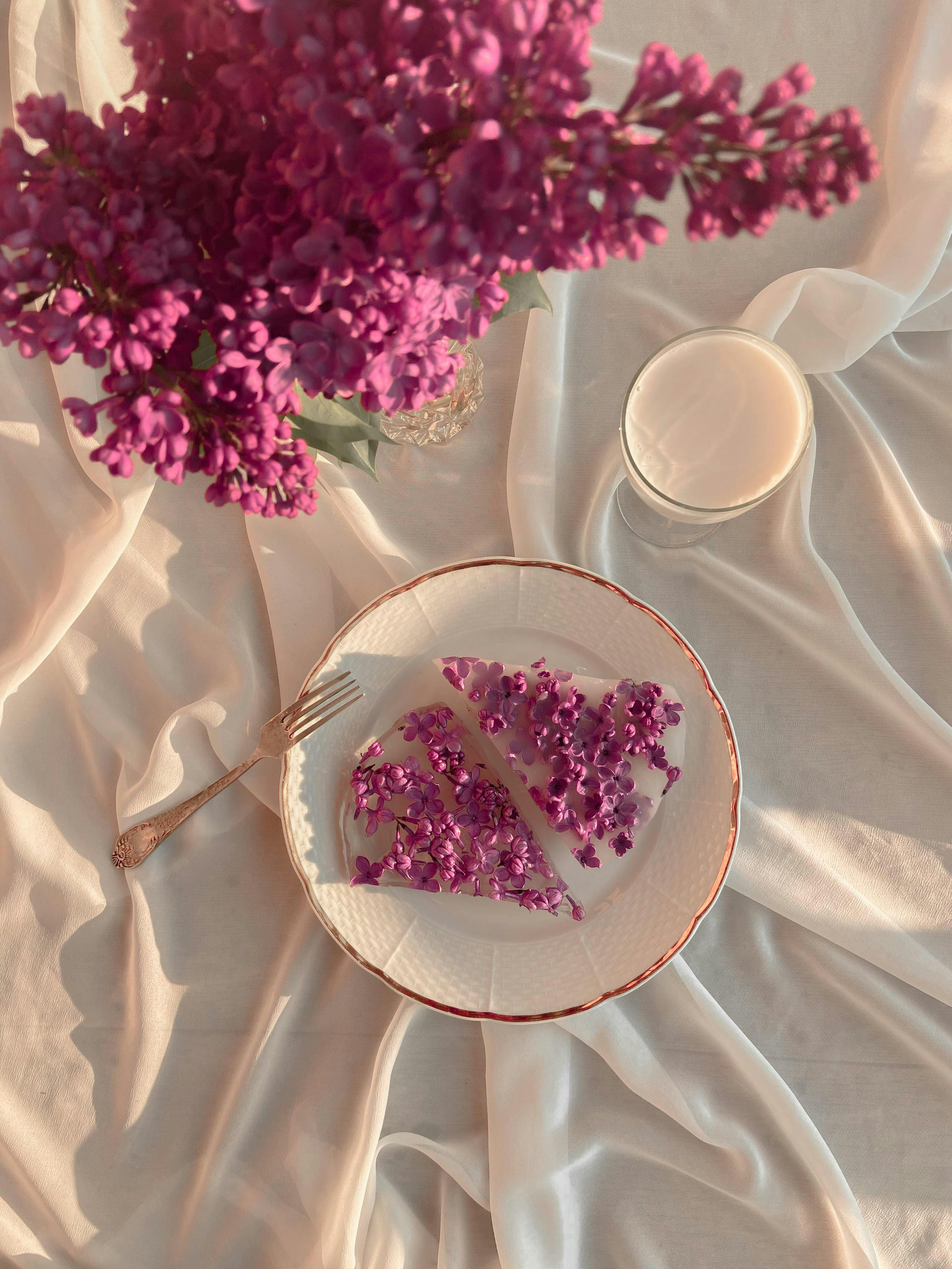 composition of fresh flowers with plate of frozen petals