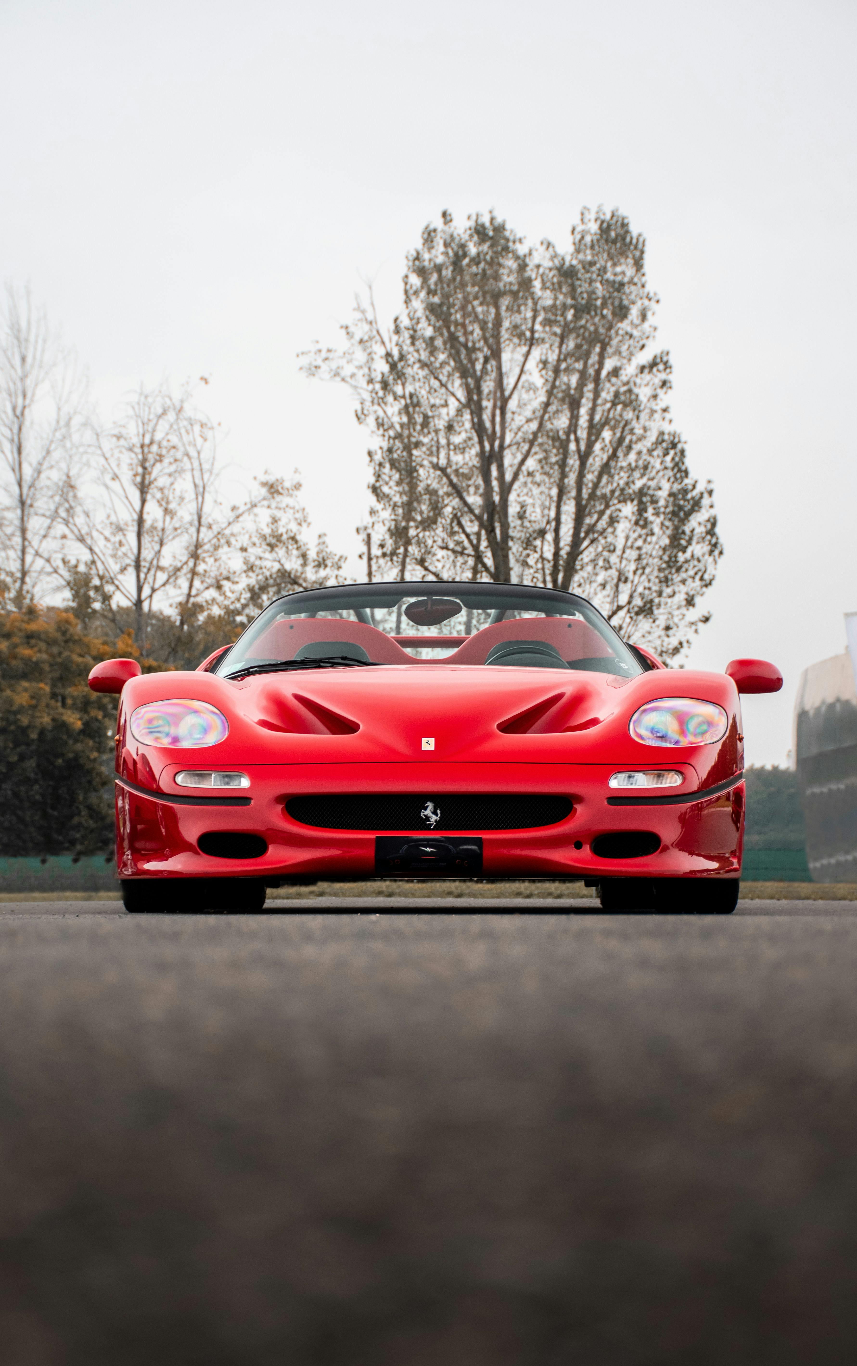 A Shiny Red Ferrari F50 GT · Free Stock Photo