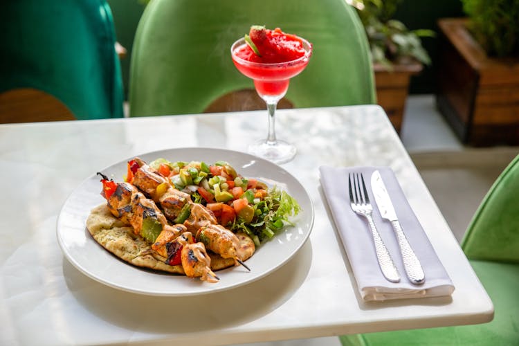 Grilled Meat And Salad On Plate