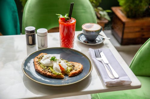 Free Poached Egg and Avocado on Toast Stock Photo