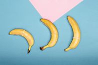 Yellow Banana on Purple Paper