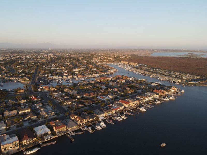 Aerial view of Huntington Beach harbor and marina at sunset, Orange County California