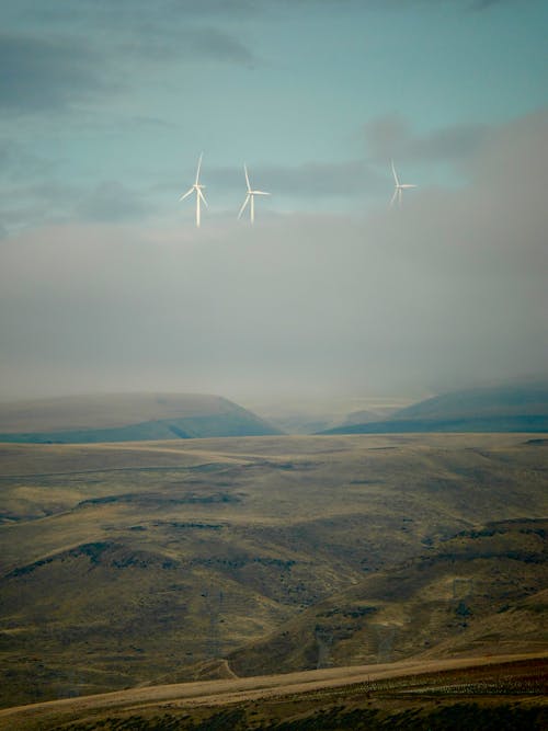 Photo of Wind Turbines on Hills